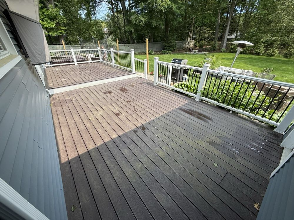 Composite deck before, faded and grimy