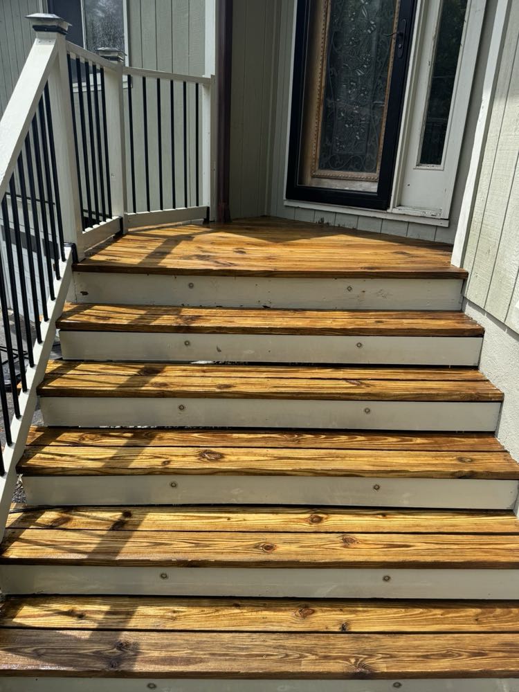 Wood deck stairs after restoration washing
